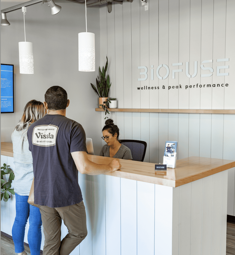 Couple getting attention at Biofuse's Front Desk