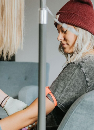 Woman getting ready for IV therapy  to be applied - Biofuse